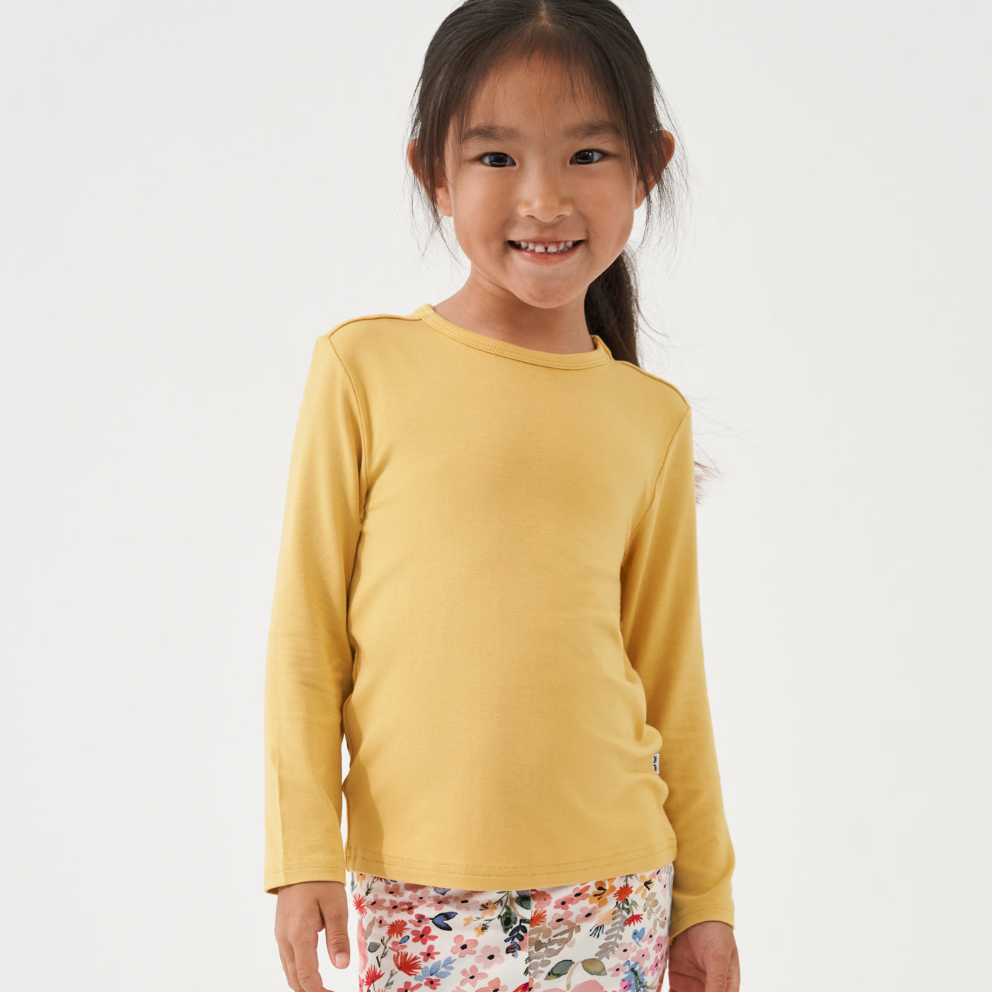 Child wearing a Honey classic tee