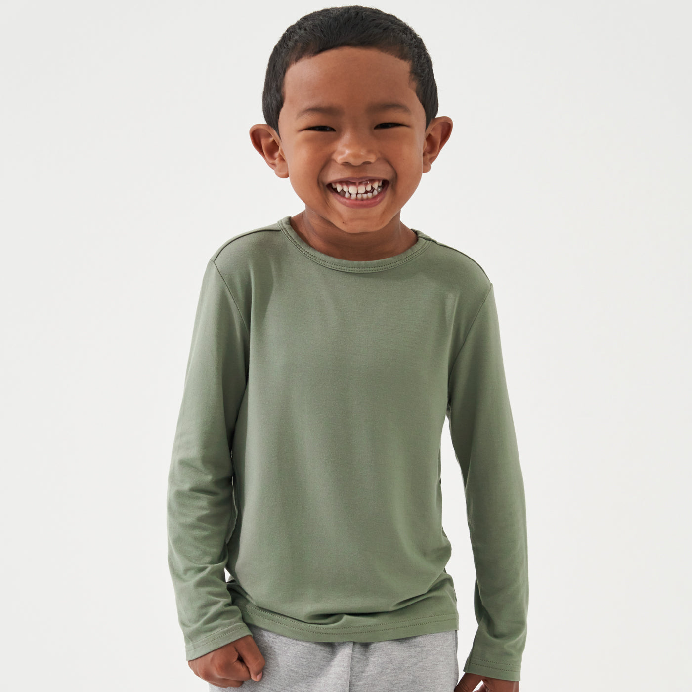 Child wearing a Moss classic tee