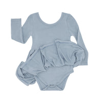 Flat lay image of a Fog twirl dress with bodysuit showing the bodysuit