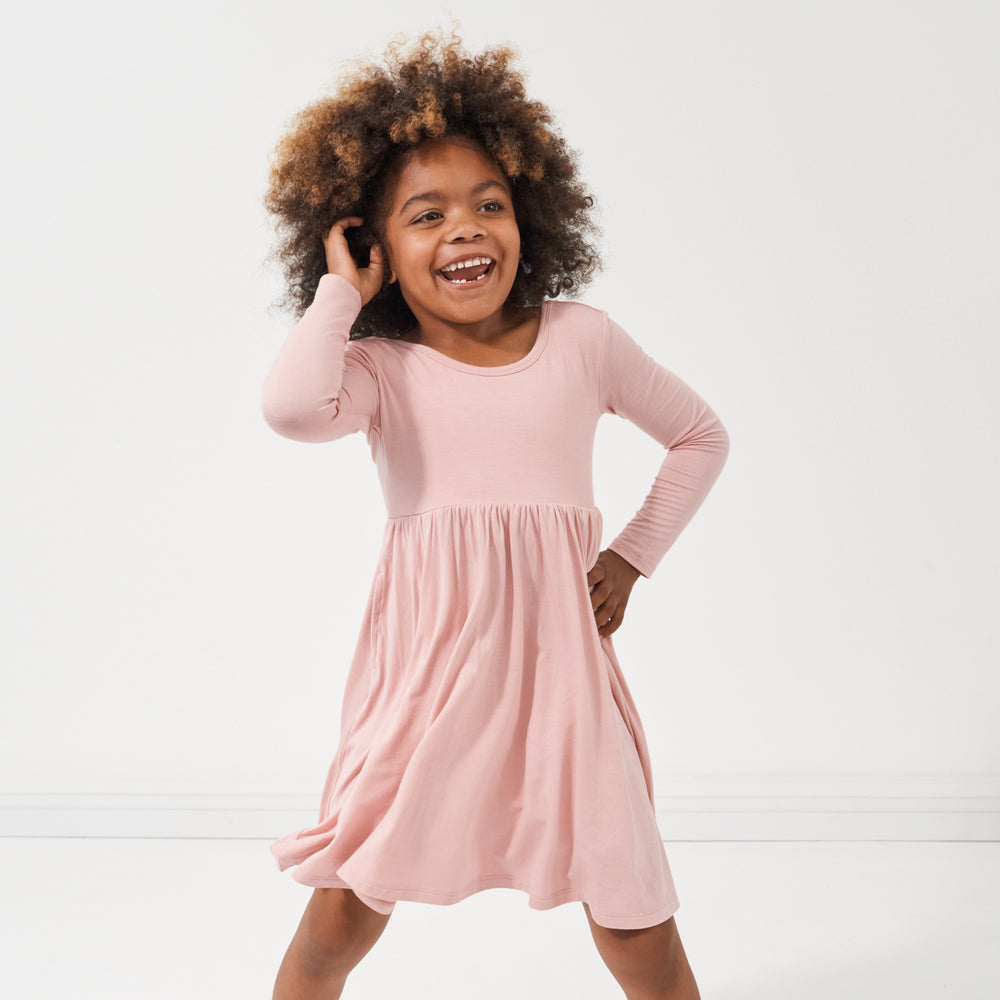 Alternate image of a child dancing wearing a Mauve Blush twirl dress
