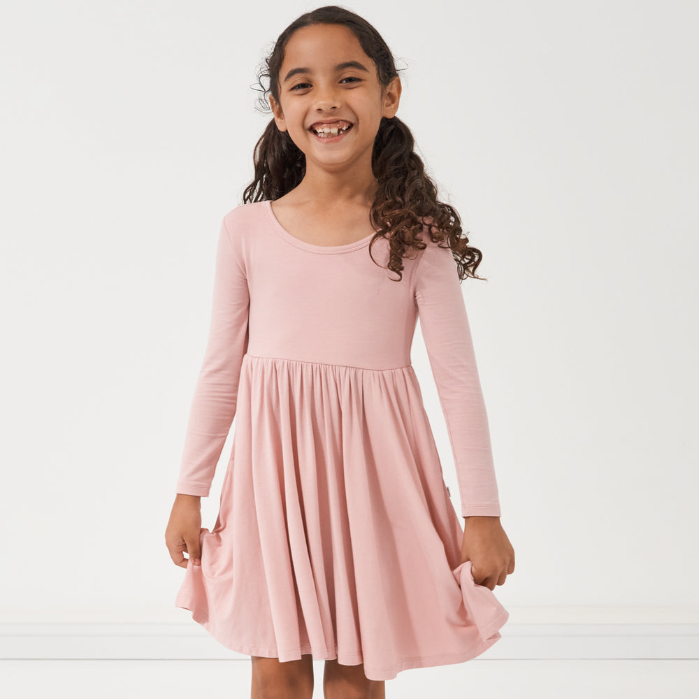 Child wearing a Mauve Blush twirl dress