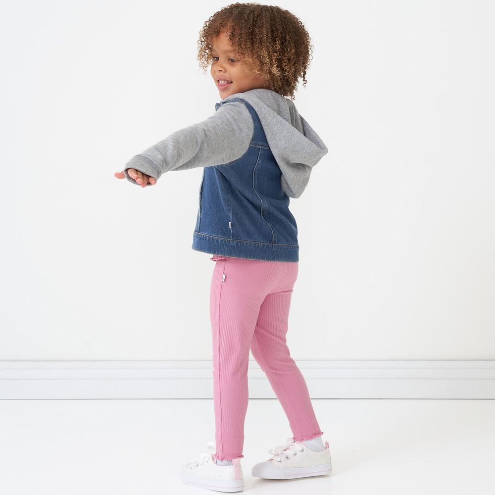 Child wearing a Garden Rose ribbed lettuce legging paired with a jean jacket