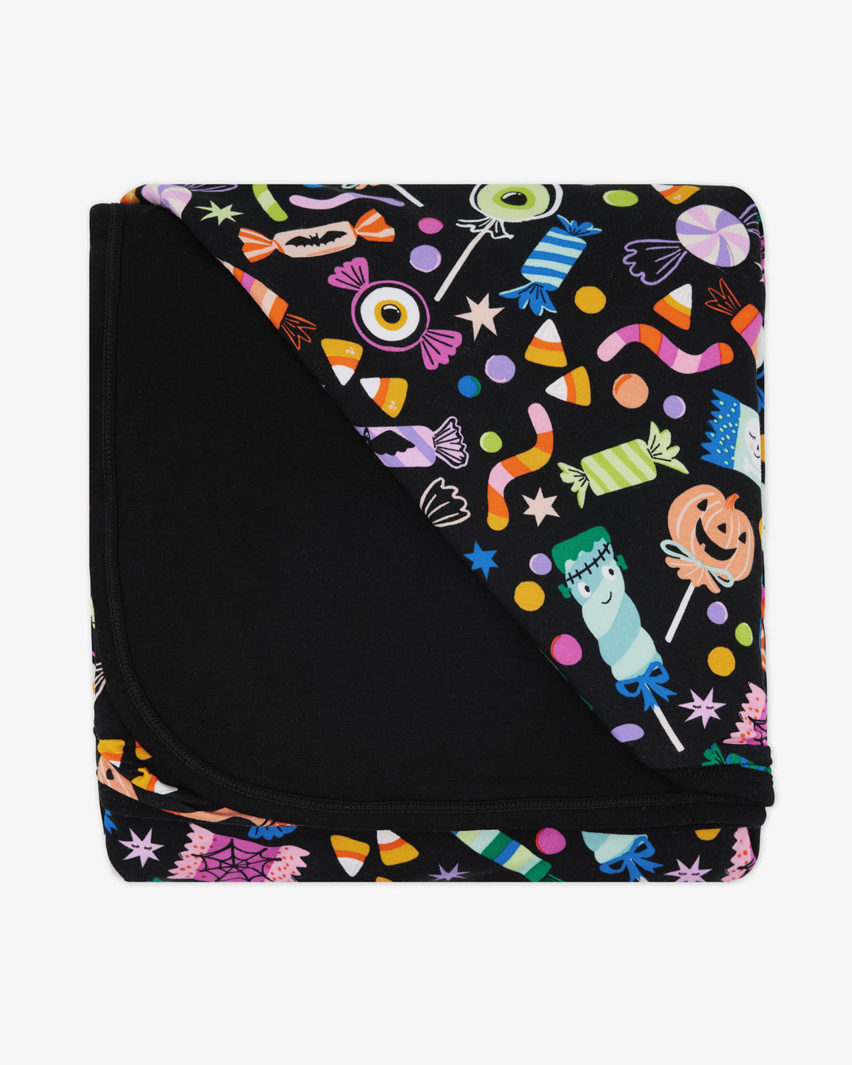Flat lay of the Halloween Haul Large Cloud Blanket®
