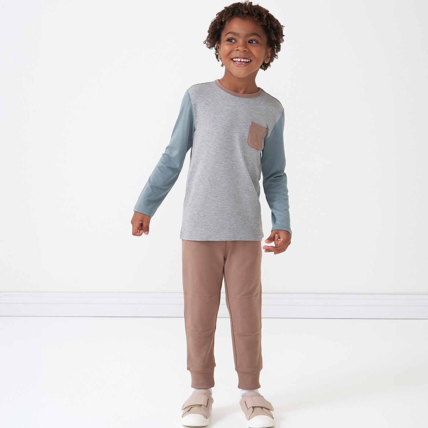 Child wearing a Colorblock Pocket tee paired with Light Cocoa joggers