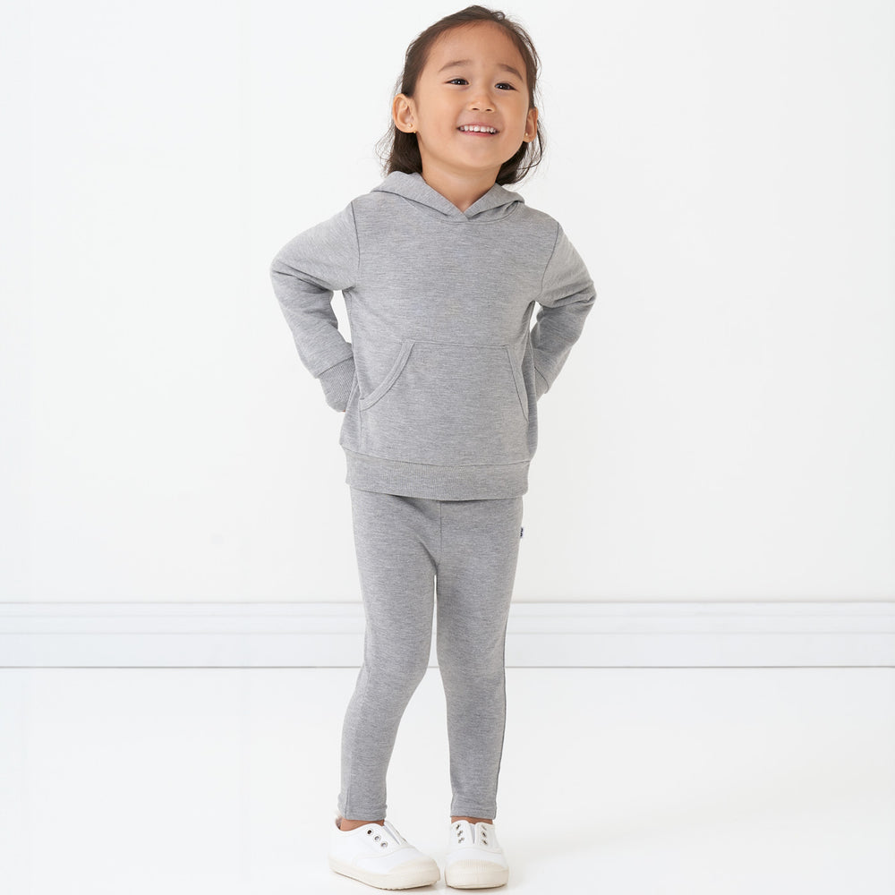 Child wearing Heather Gray cozy leggings and matching hoodie
