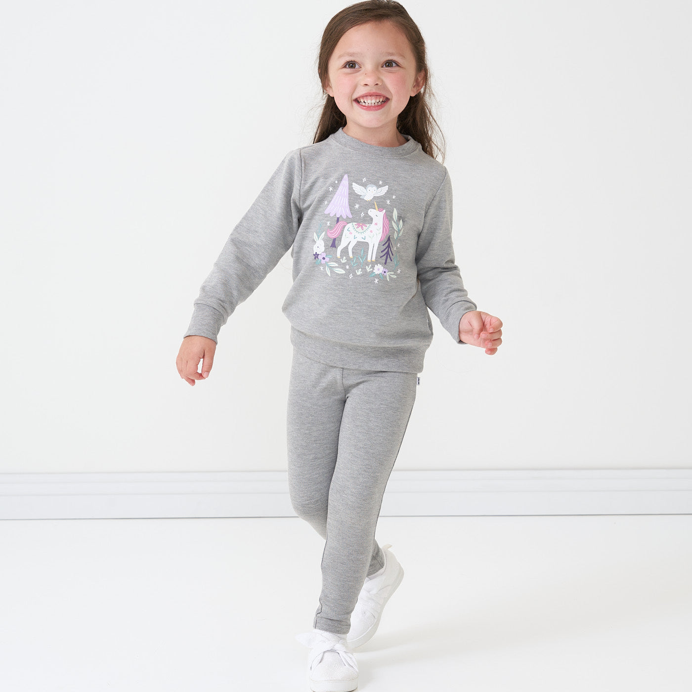 Alternate image of a child wearing a Unicorn crewneck sweatshirt paired with Heather Gray cozy leggings