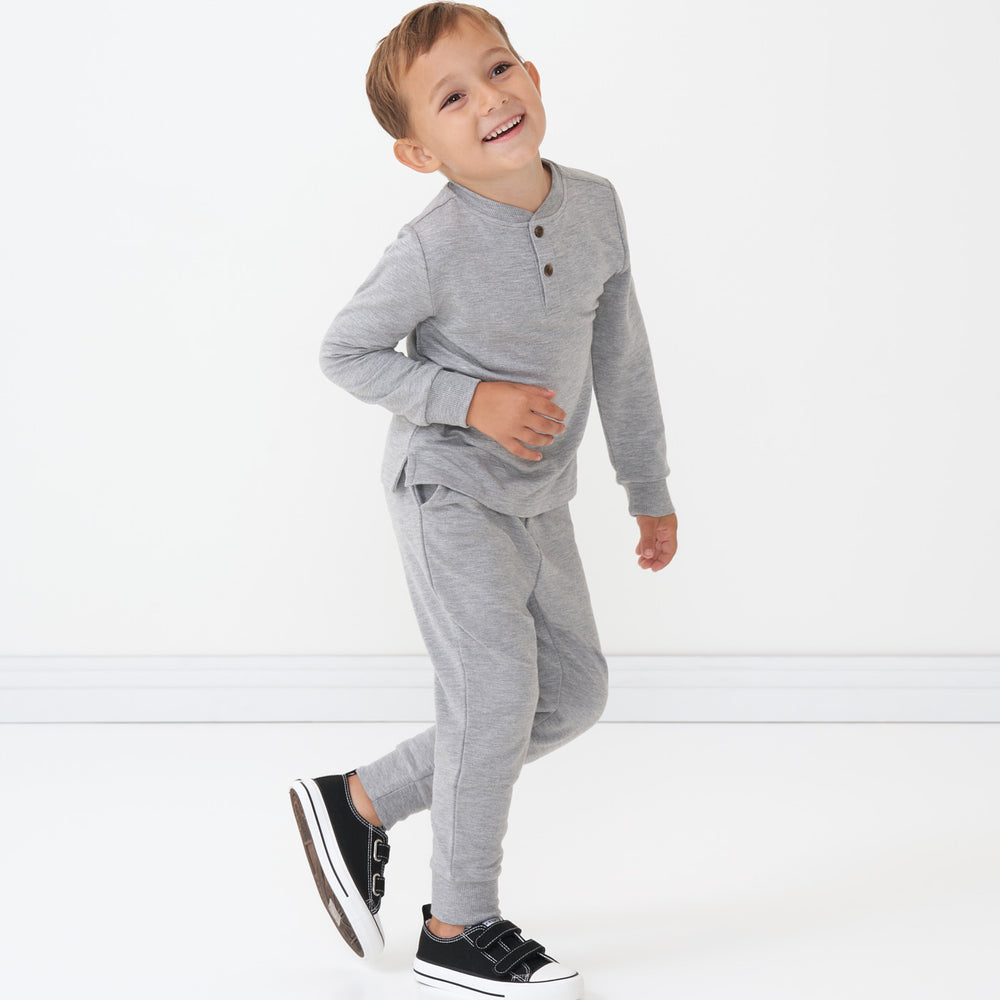 Click to see full screen - Child wearing Heather Gray Jogger paired with matching Henley Tee