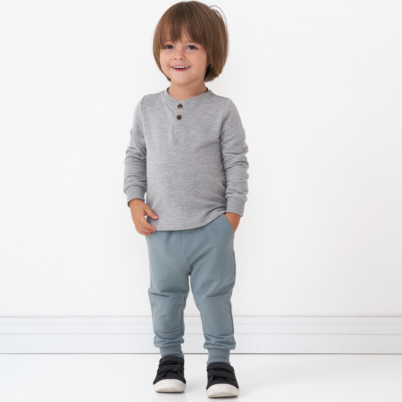 alternate image of a child wearing a Heather Gray henley tee paired with coordinating joggers