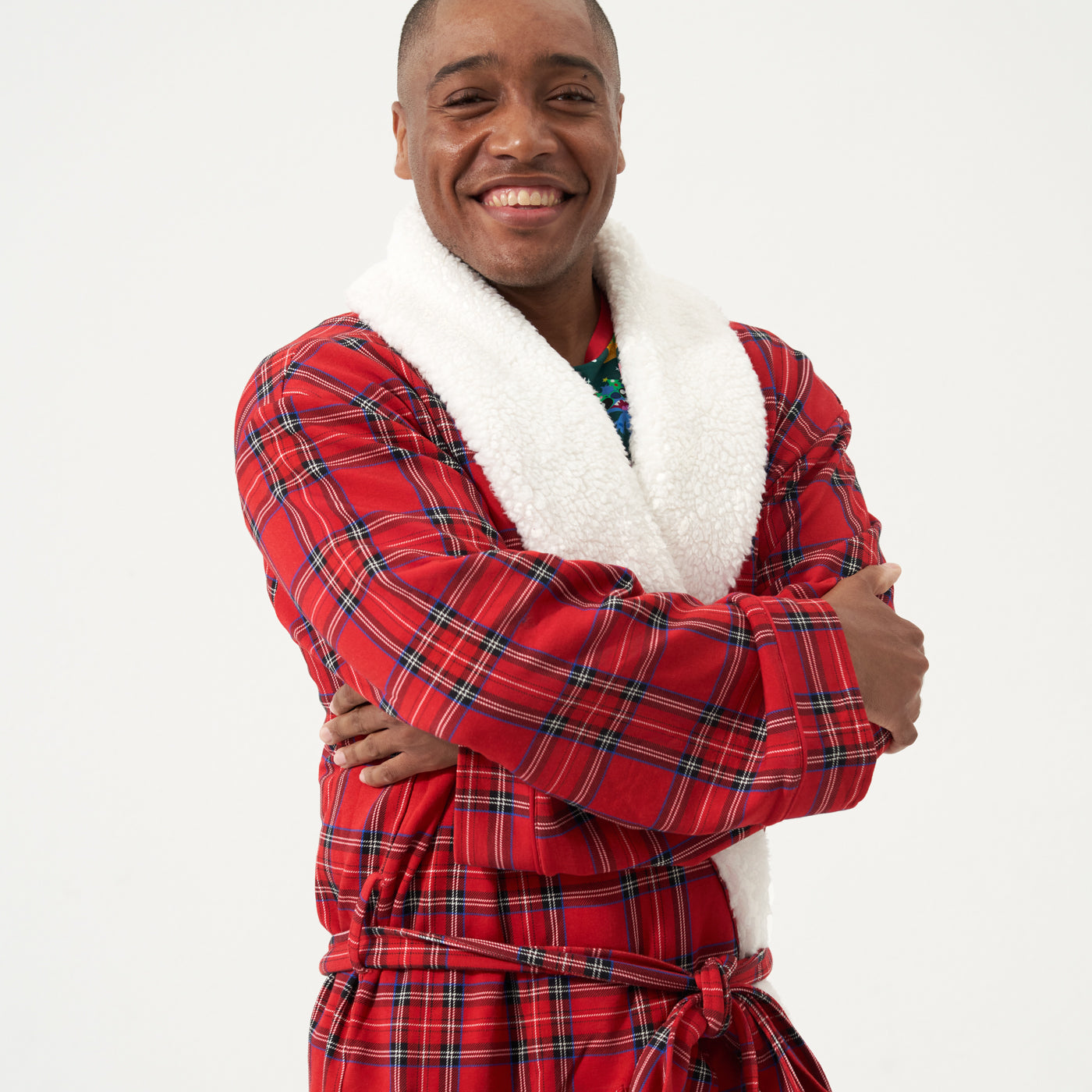 Close up image of a man wearing a Holiday Plaid cozy robe