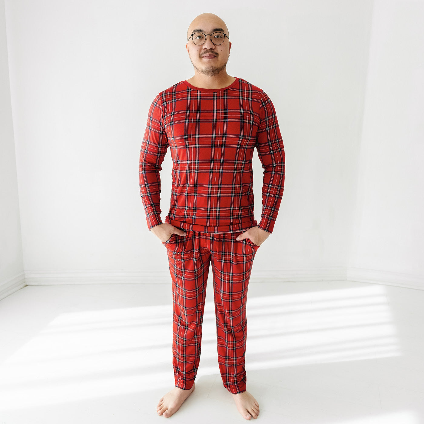 Man wearing Holiday Plaid men's pajama top and matching pajama pants