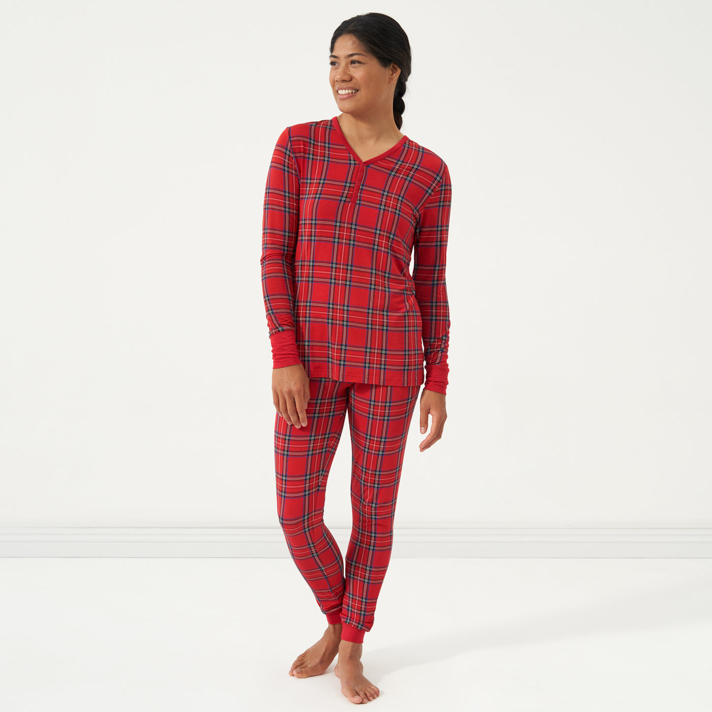 Woman wearing Holiday Plaid women's pajama pants and matching top