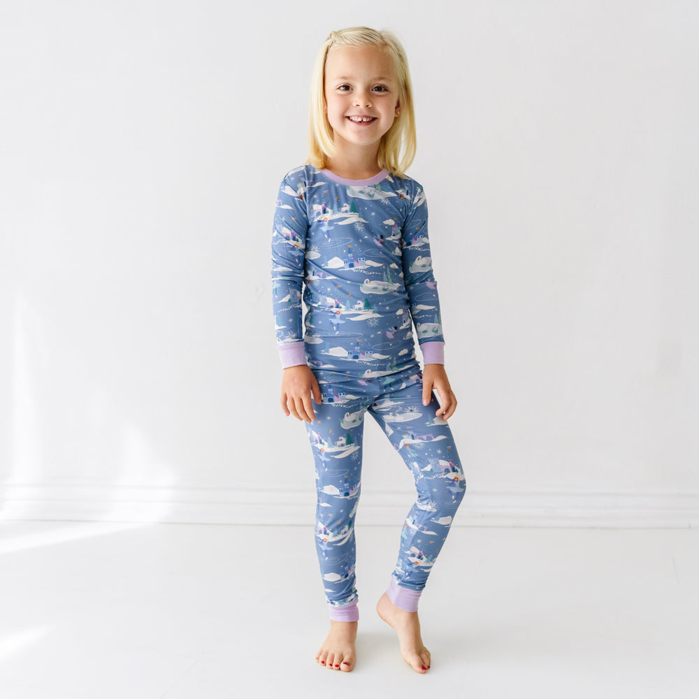 Child posing wearing an Ice Princess two piece pajama set
