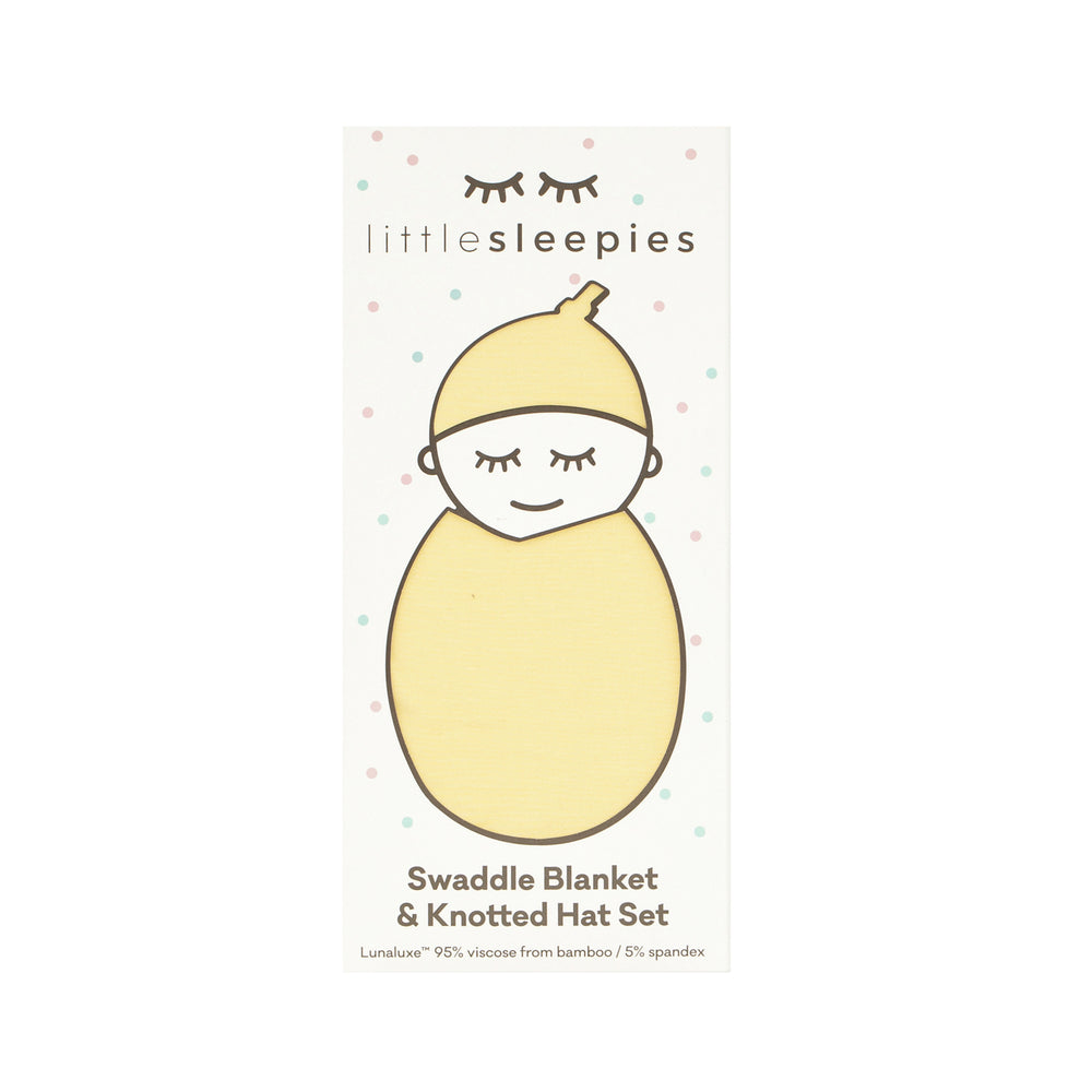 Lemon twist swaddle and hat set in Little Sleepies peek a boo packaging