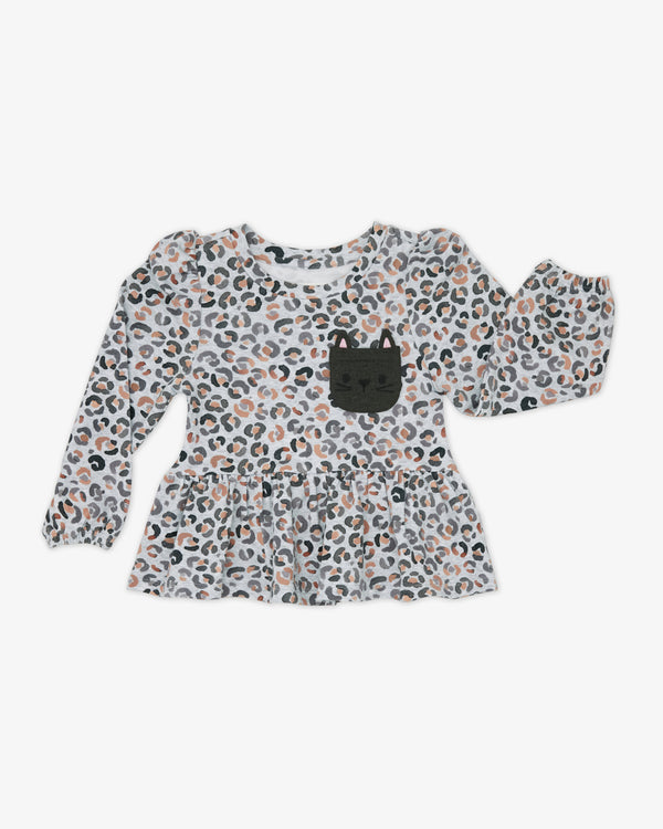 Flat lay of the Snowy Leopard Puff Sleeve Peplum Top