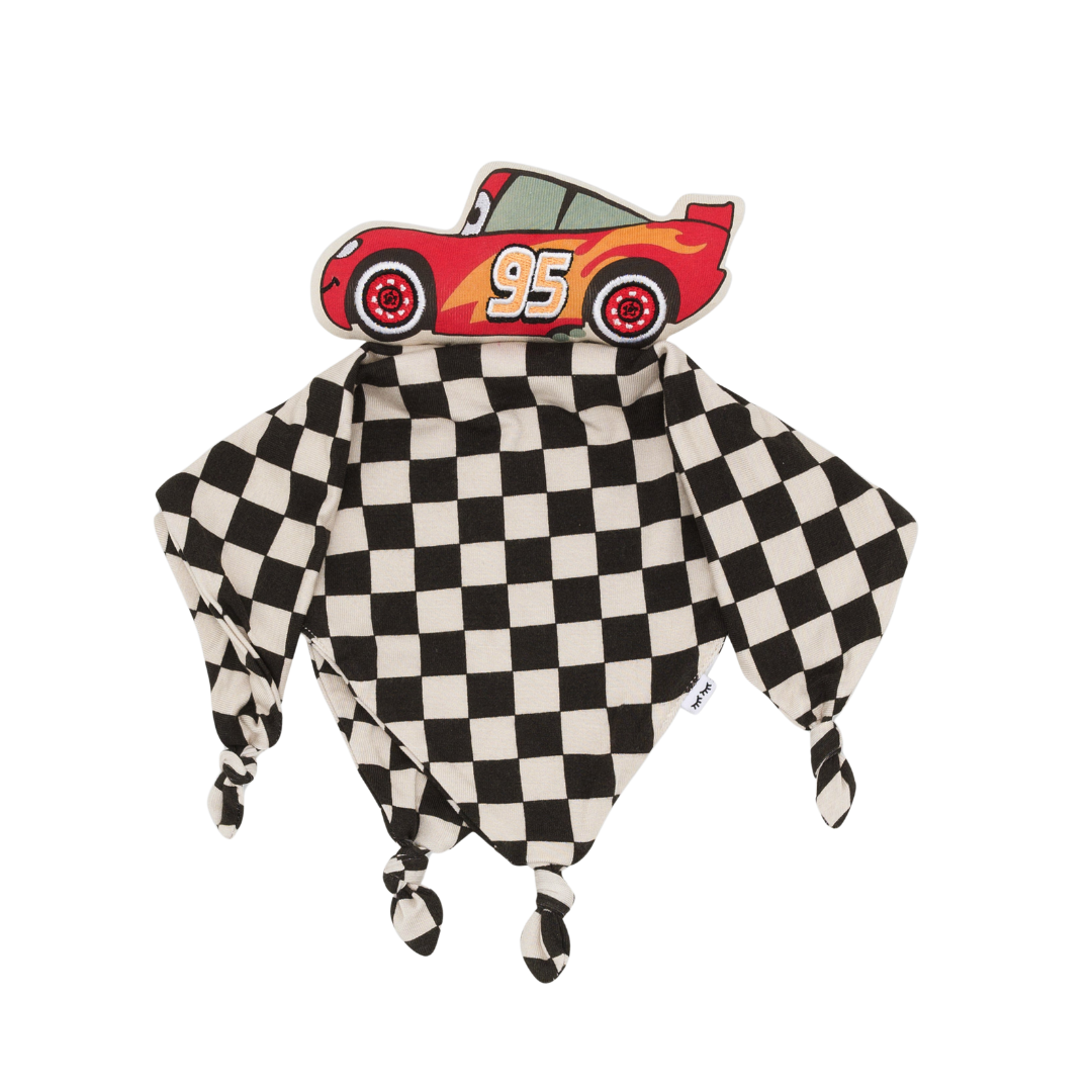 Flat lay image of Lightning McQueen lovey