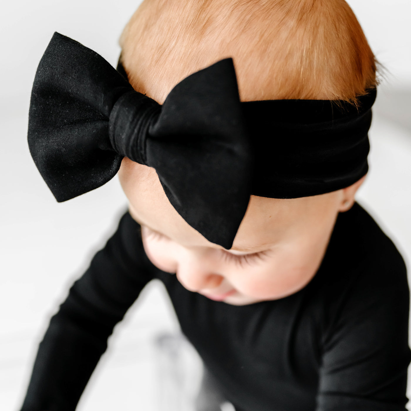 Close up image of the Luxe Bow - Black Luxe Bow Headband