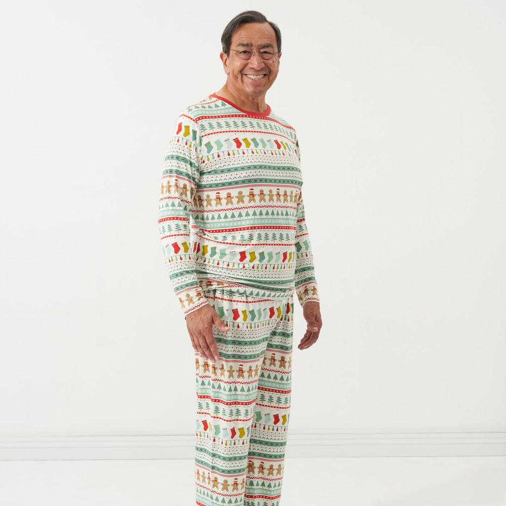 Profile view of a man wearing men's Fair Isle pajama pants and matching men's pajama top