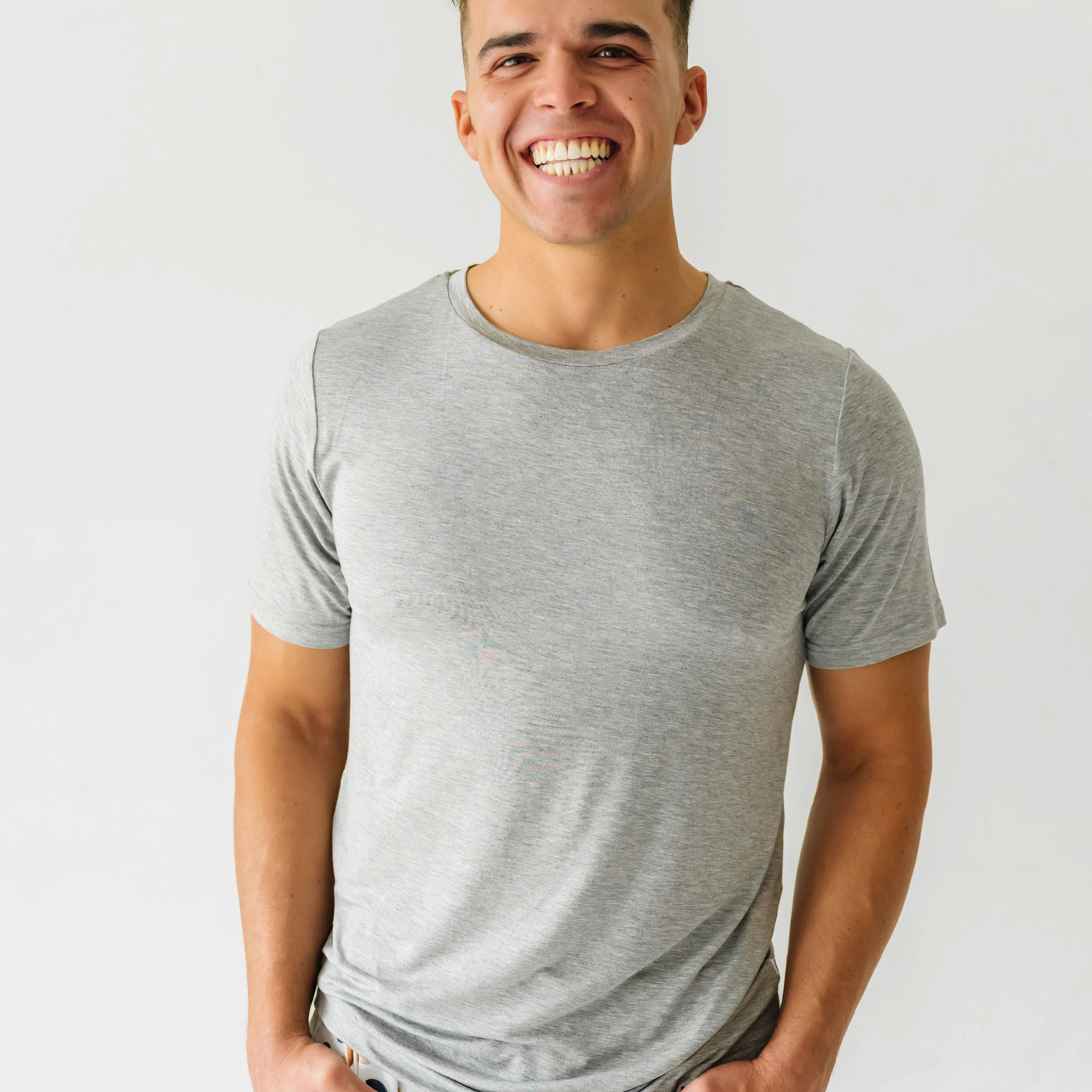 Close up of man wearing the Heather Gray Men's Short Sleeve Pajama Top