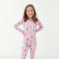 Alternate image of a child posing wearing a Pink Merry and Bright two piece pajama set