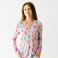 Woman wearing Pink Merry and Bright women's pajama top