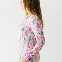 Profile view of woman wearing Pink Merry and Bright women's pajama top