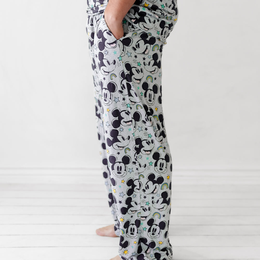 Side view image of a man wearing Mickey Forever printed men's pajama pants