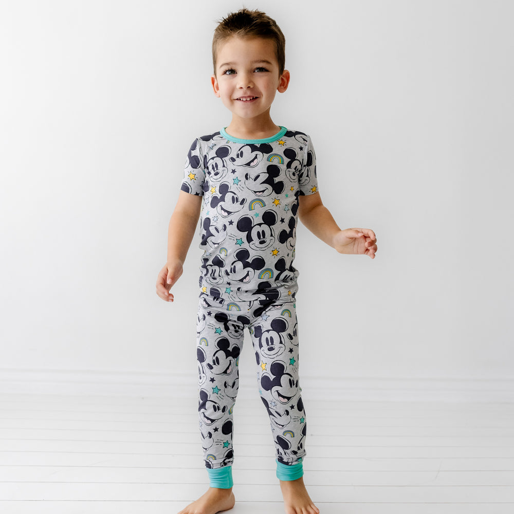 Child wearing a Mickey Forever printed two piece short sleeve pajama set