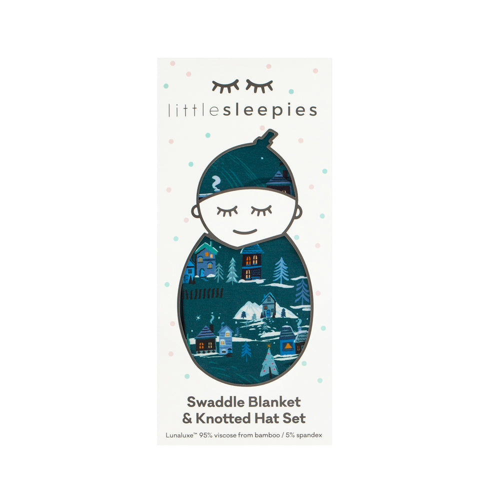 Midnight Express swaddle and hat set in Little Sleepies peek a boo packaging 