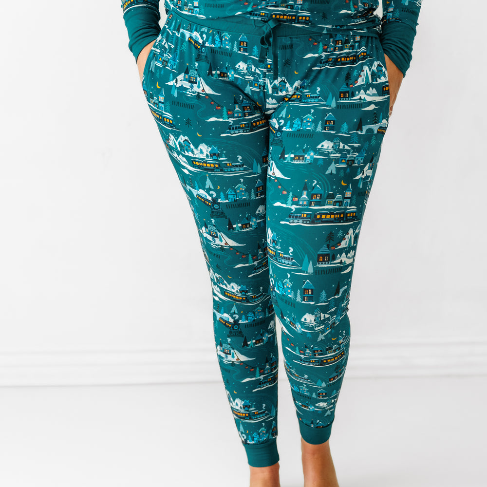 close up image of a woman wearing Midnight Express women's pajama pants showing off the pockets