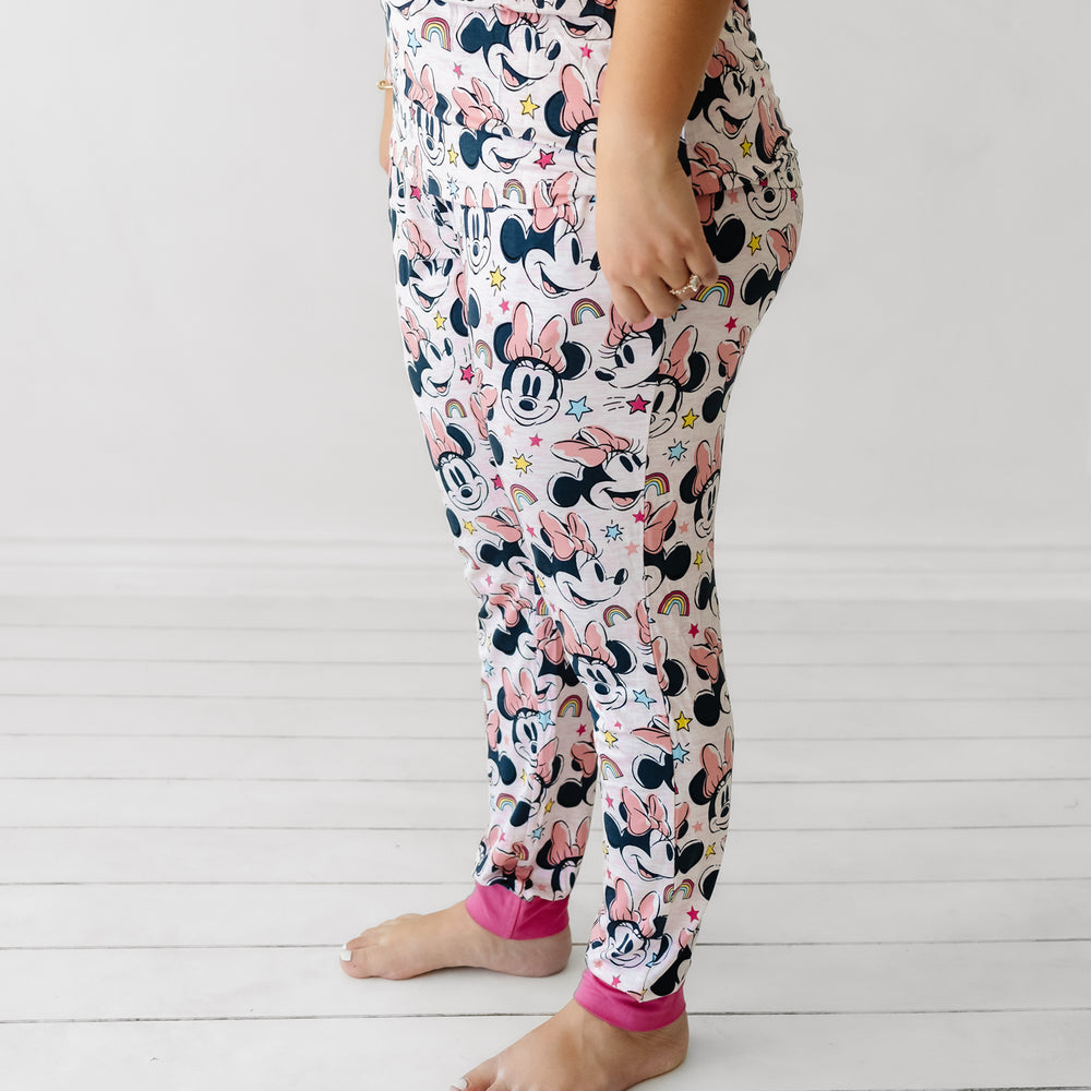 Side view image of a woman wearing Minnie Forever printed women's pajama pants
