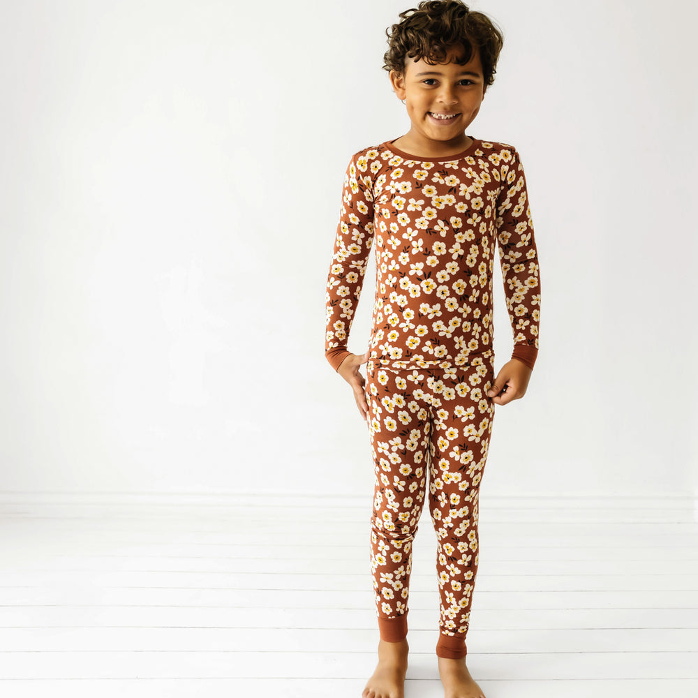 Click to see full screen - Child wearing a Mocha Blossom printed long sleeve pajama set