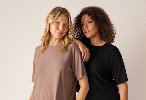 Two women wearing Lounge Tees