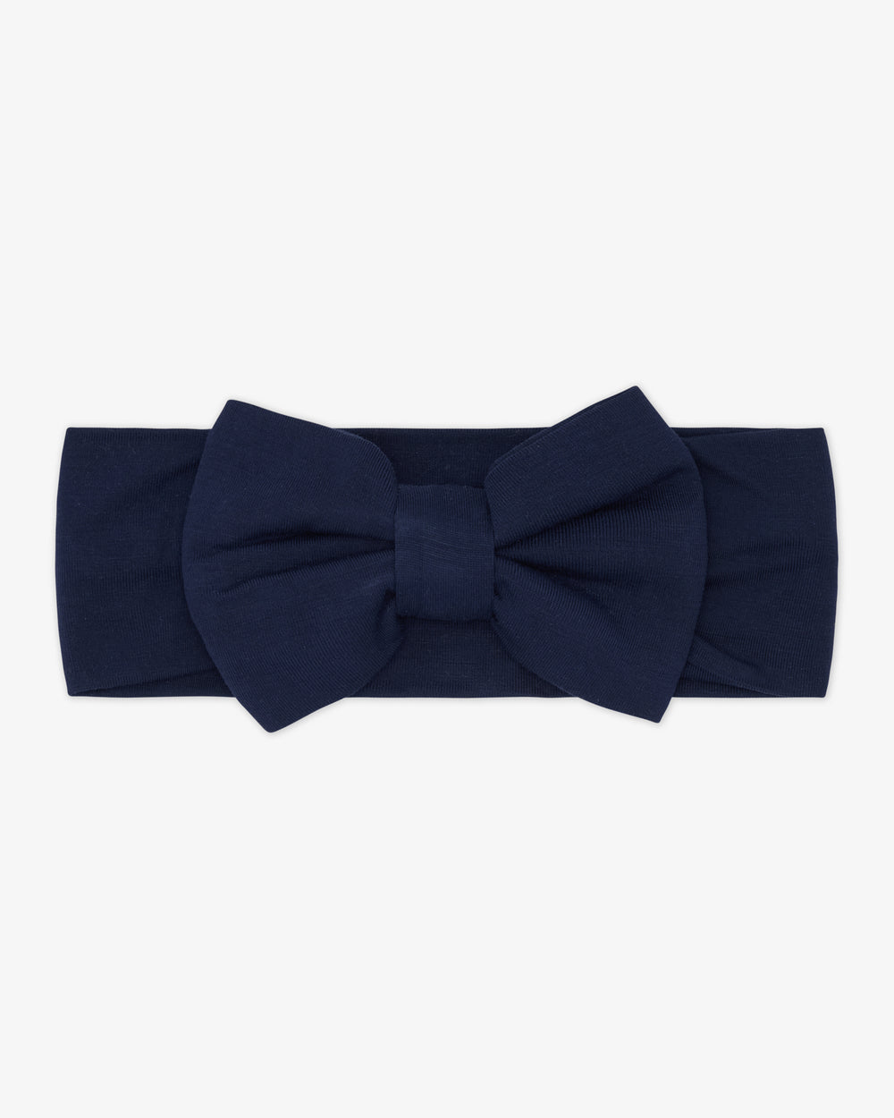 Flat lay of the Classic Navy Luxe Bow Headband