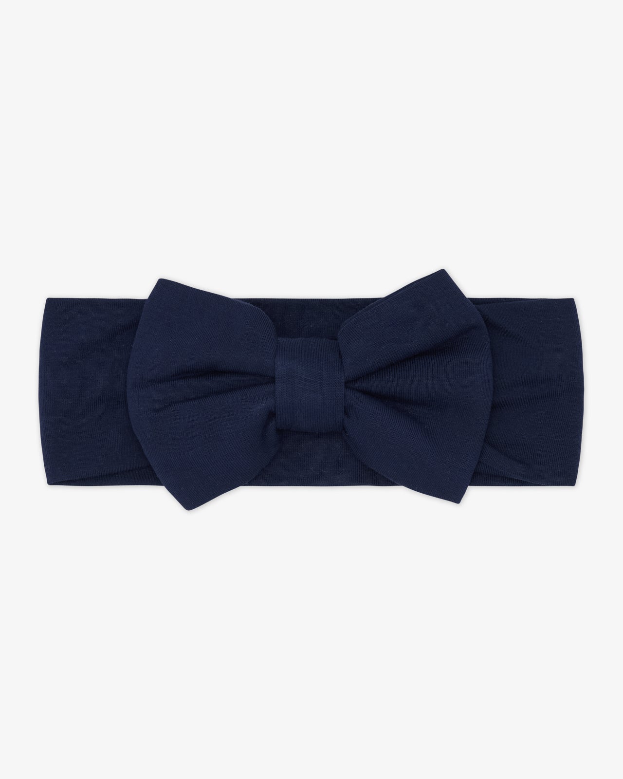 Flat lay of the Classic Navy Luxe Bow Headband