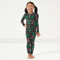 Alternate image of a child posing wearing a Night at the Nutcracker two piece pajama set