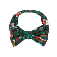 Flat lay image of an age 4 to age 8 Night at the Nutcracker luxe bow headband