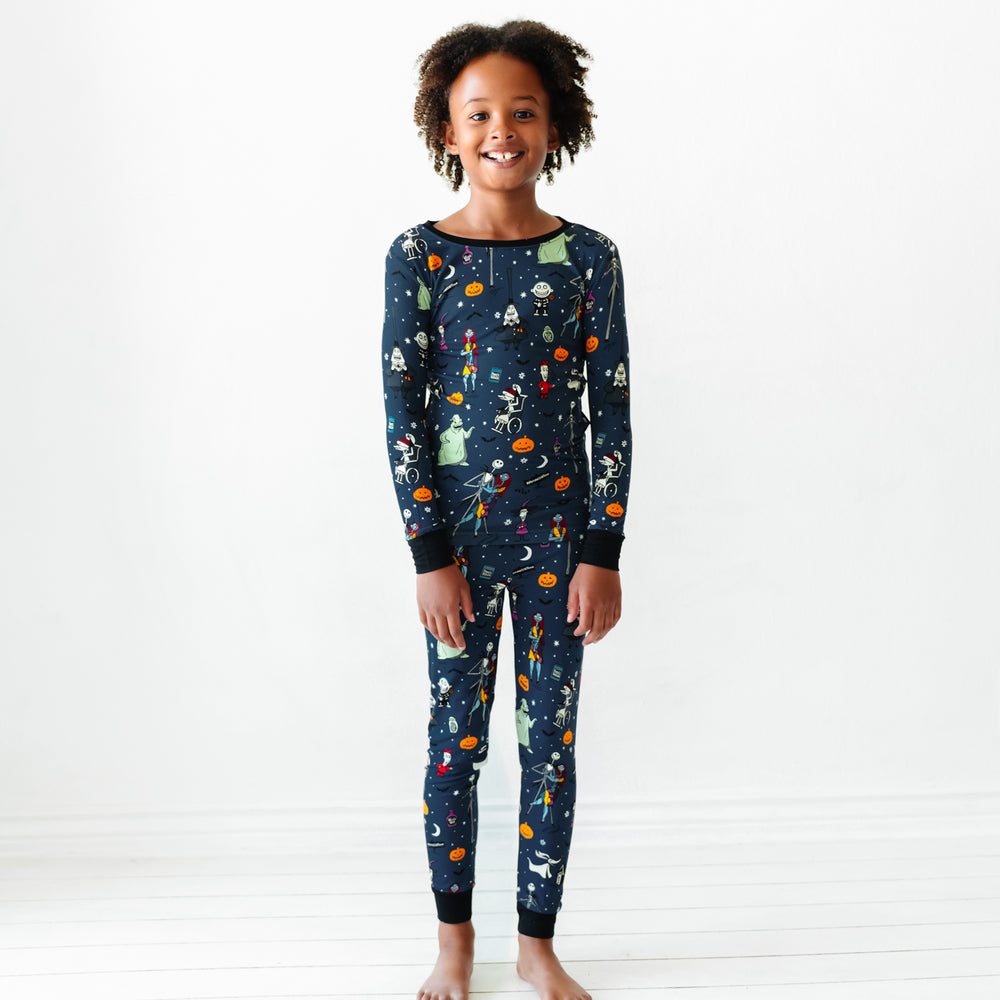 Alternate image of a child wearing a Jack Skellington and Friends printed two-piece pajama set