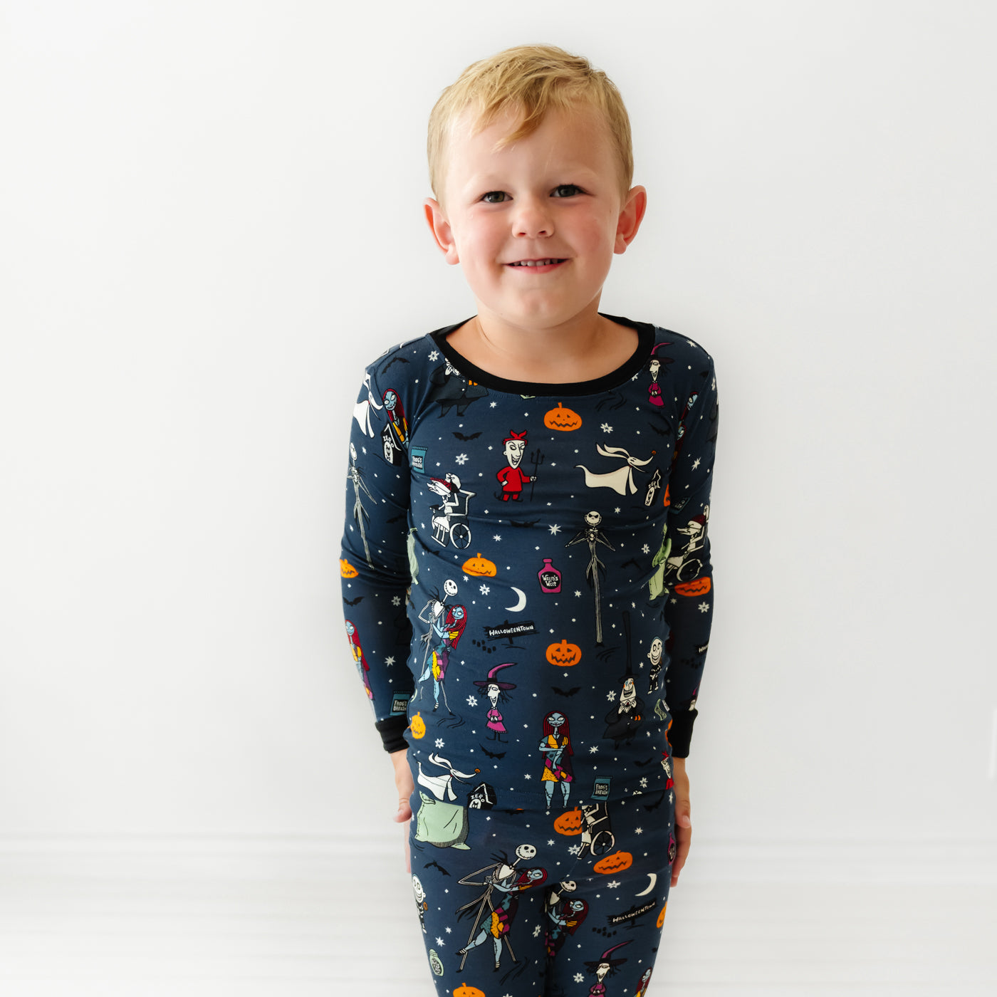 Child wearing a Jack Skellington and Friends printed two-piece pajama set
