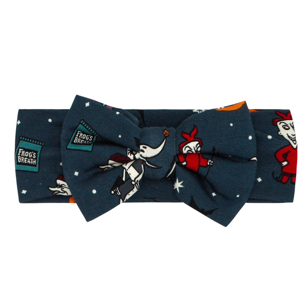 Flat lay image of a Jack Skellington and Friends printed luxe bow headband