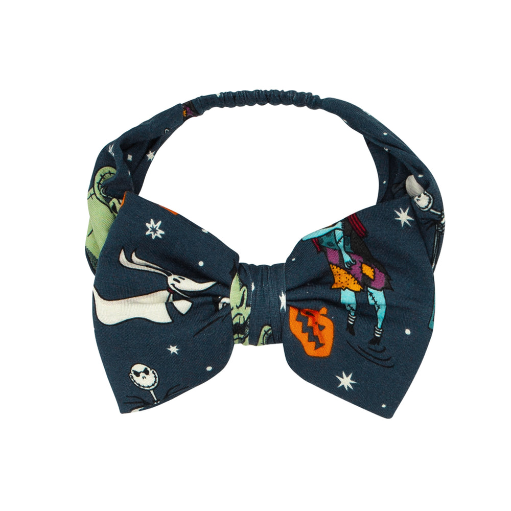 Alternate flat lay image of a Jack Skellington and Friends printed luxe bow headband