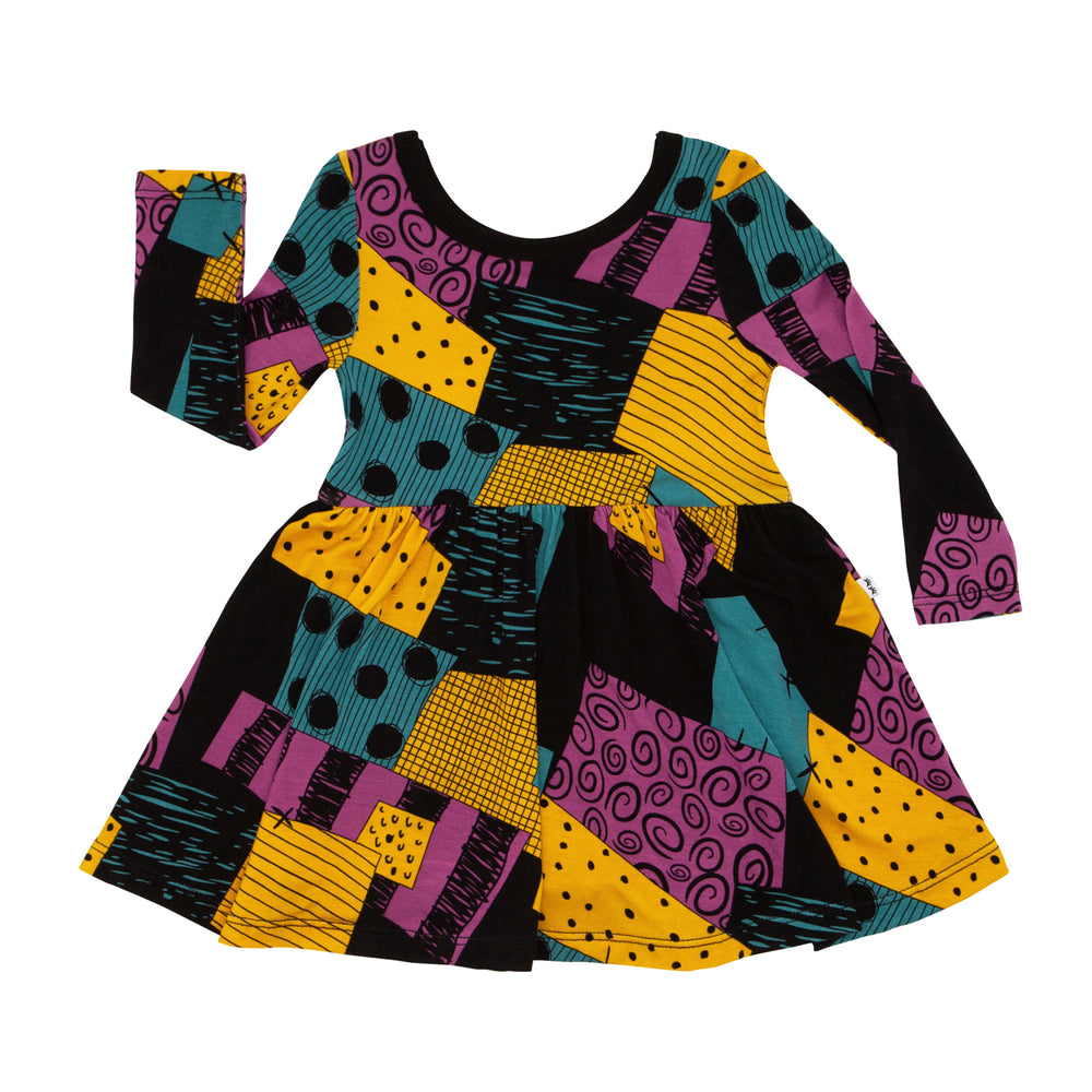 Flat lay image of a Sally's Patchwork twirl dress with bodysuit