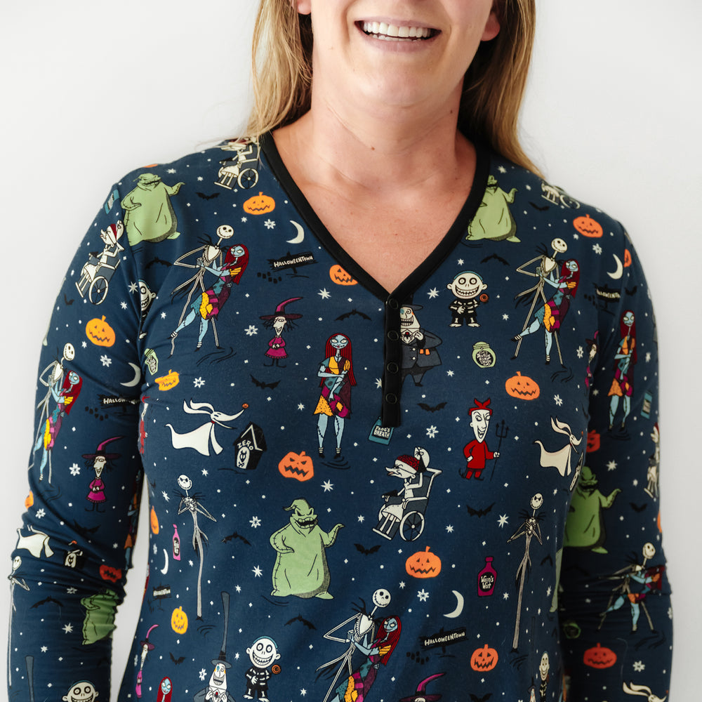 Alternate close up image of a woman wearing a Jack Skellington and Friends printed women's pajama top