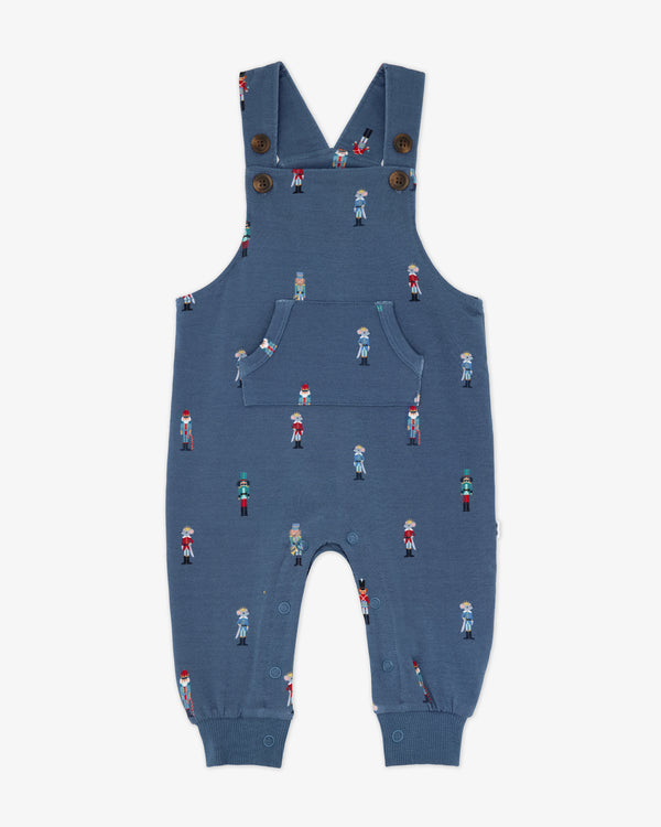 Flat lay of the Nutcracker March Overall Romper