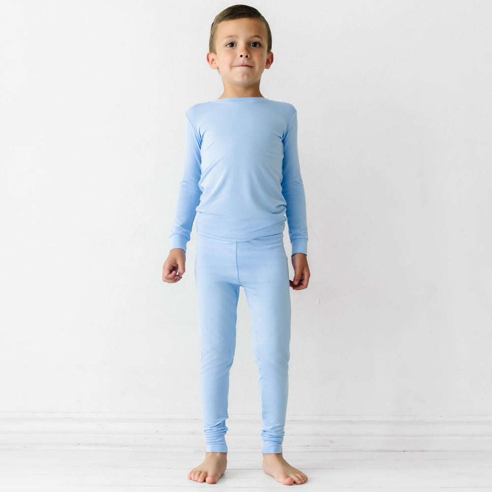 Child wearing a Periwinkle Blue two piece pajama set