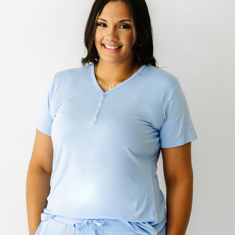 Close up image of a woman wearing a Periwinkle Blue women's short sleeve pajama top