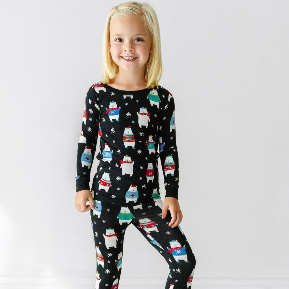 Click to see full screen - Close up image of a child wearing Polar Bear Pals two piece pajama set