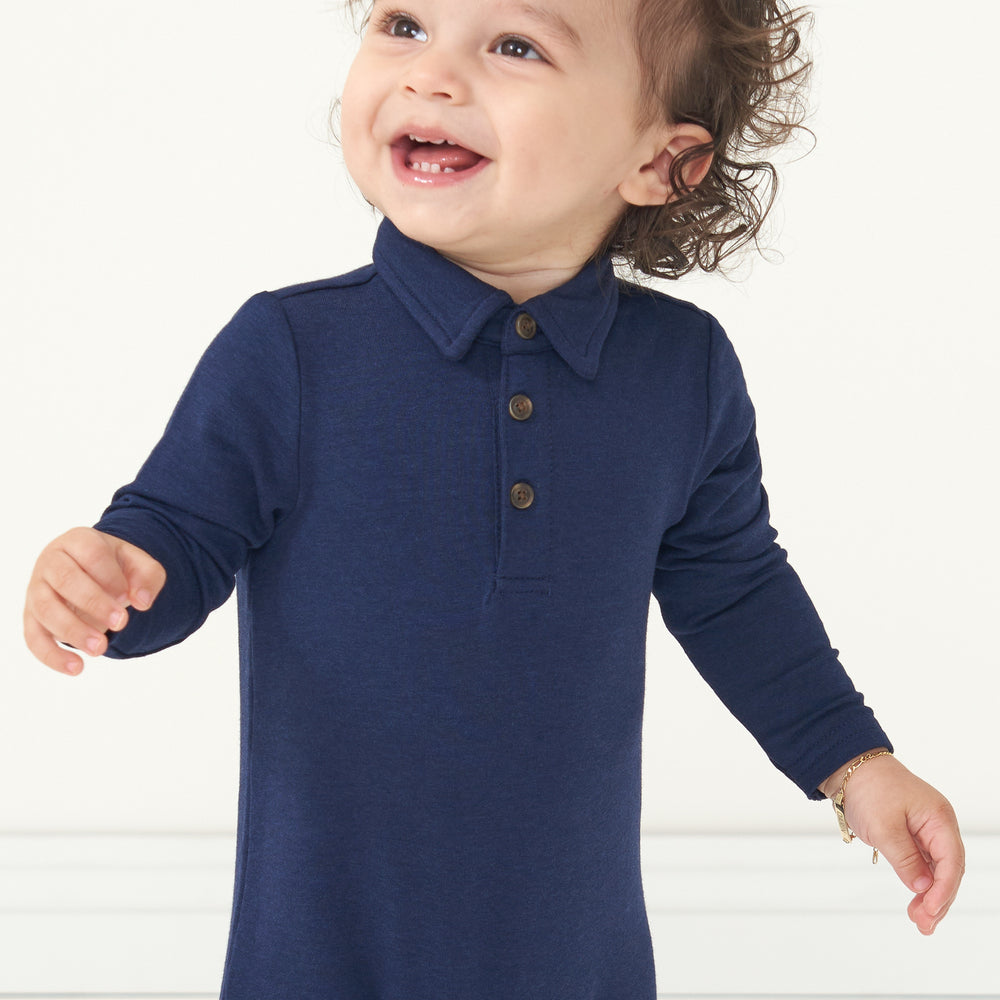 Alternate close up image of a child wearing a Classic Navy polo romper