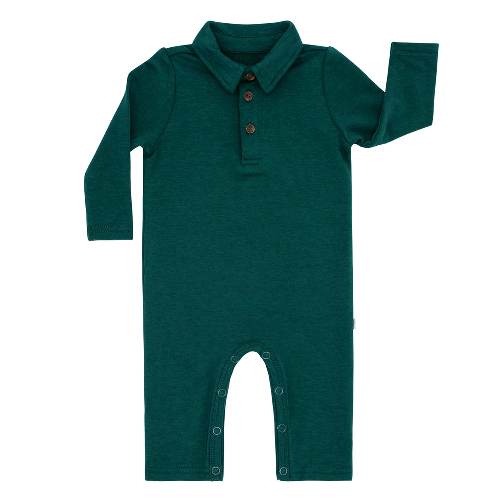 Flat lay image of an Emerald polo romper