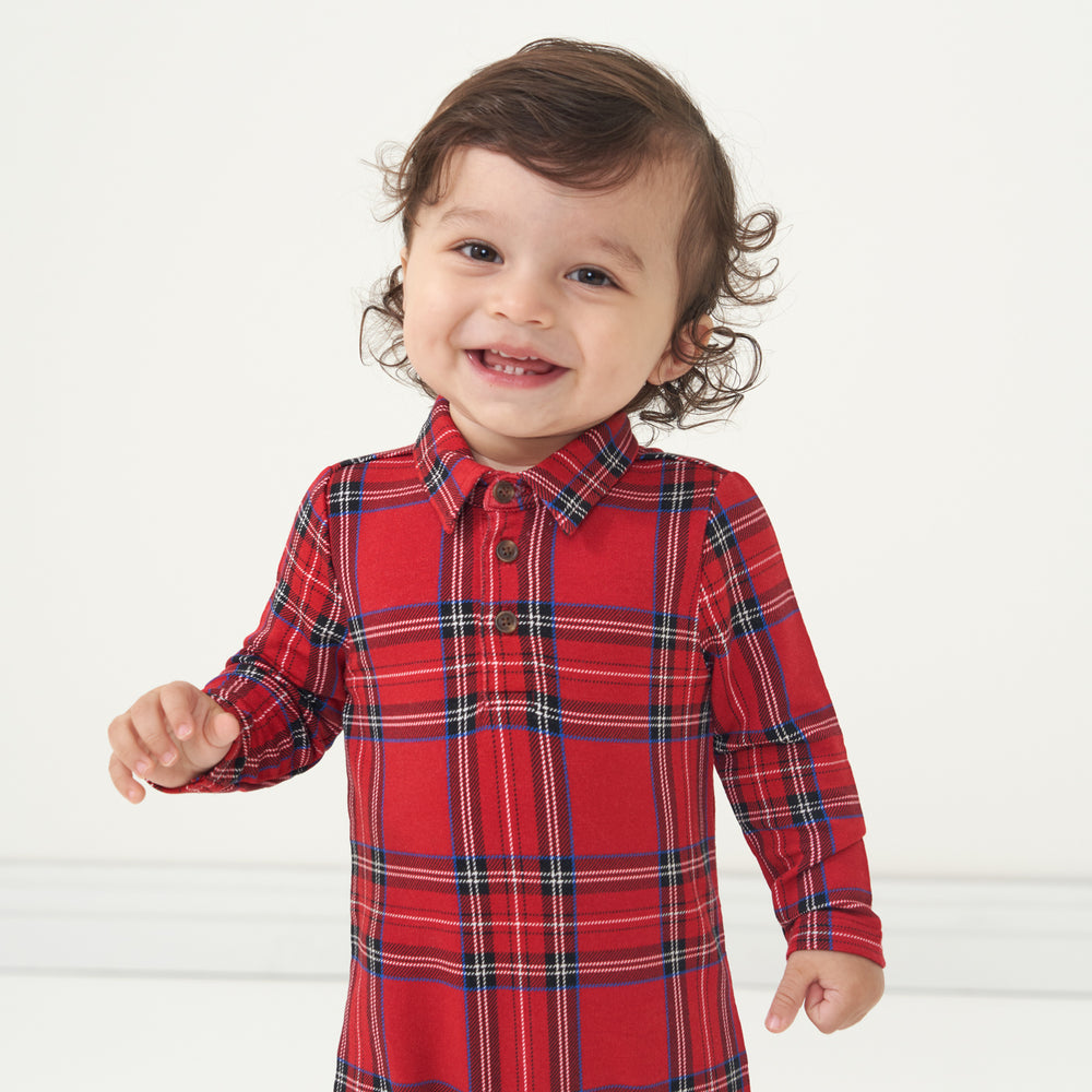 Alternate close up image of a child wearing a Holiday Plaid polo romper