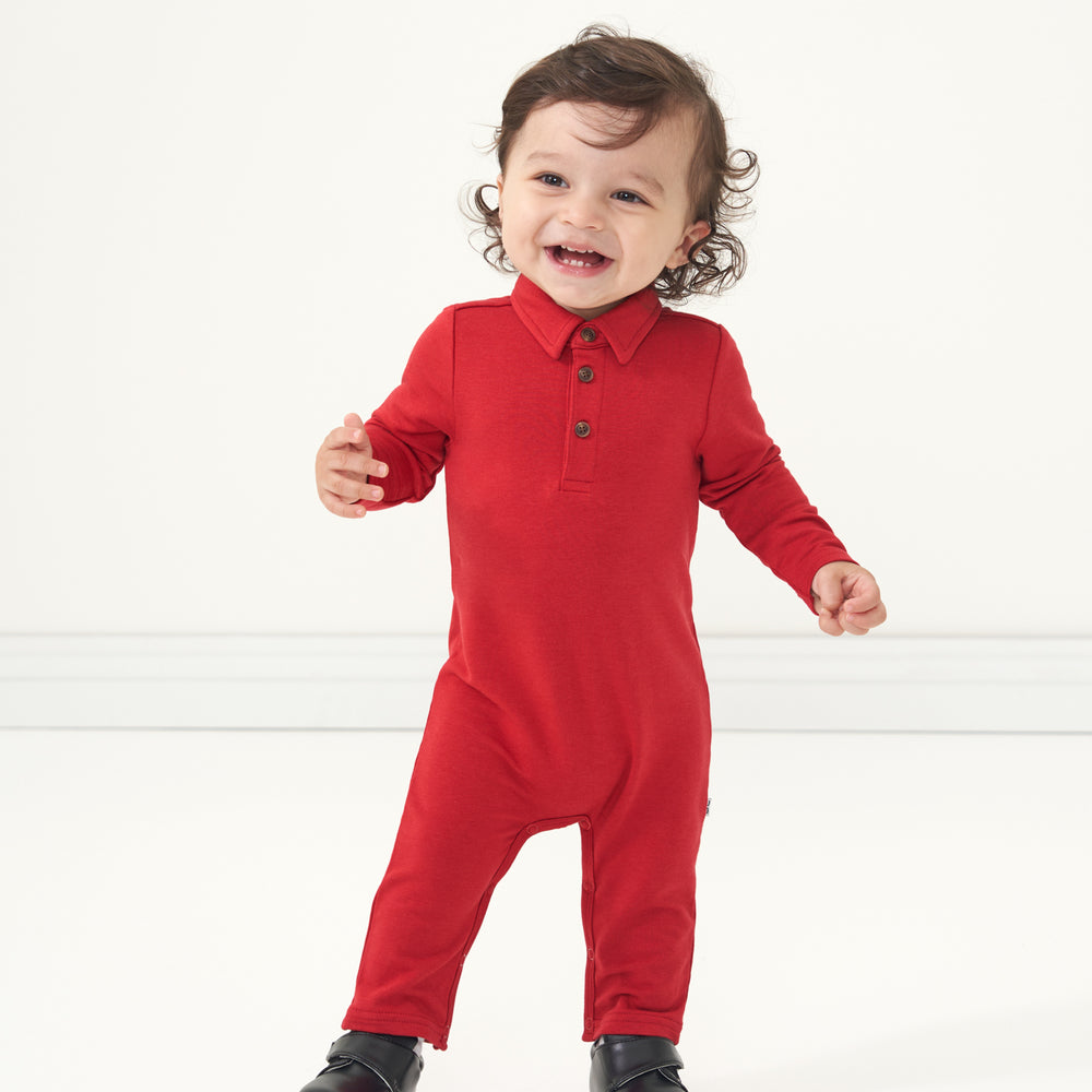Alternate image of a child posing wearing a Holiday Red polo romper